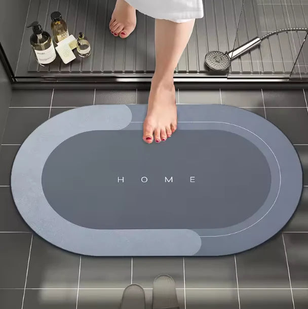 Alfombra ovalada absorbente al salir de la ducha