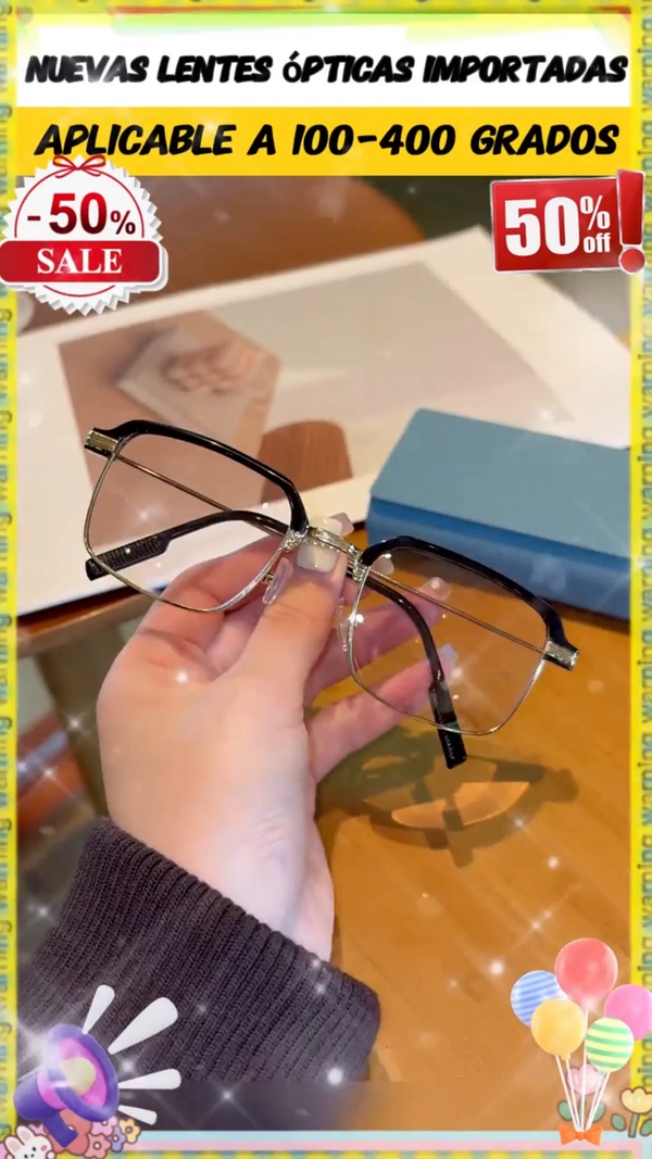 Lentes opticos multifocales sostenidos en la mano