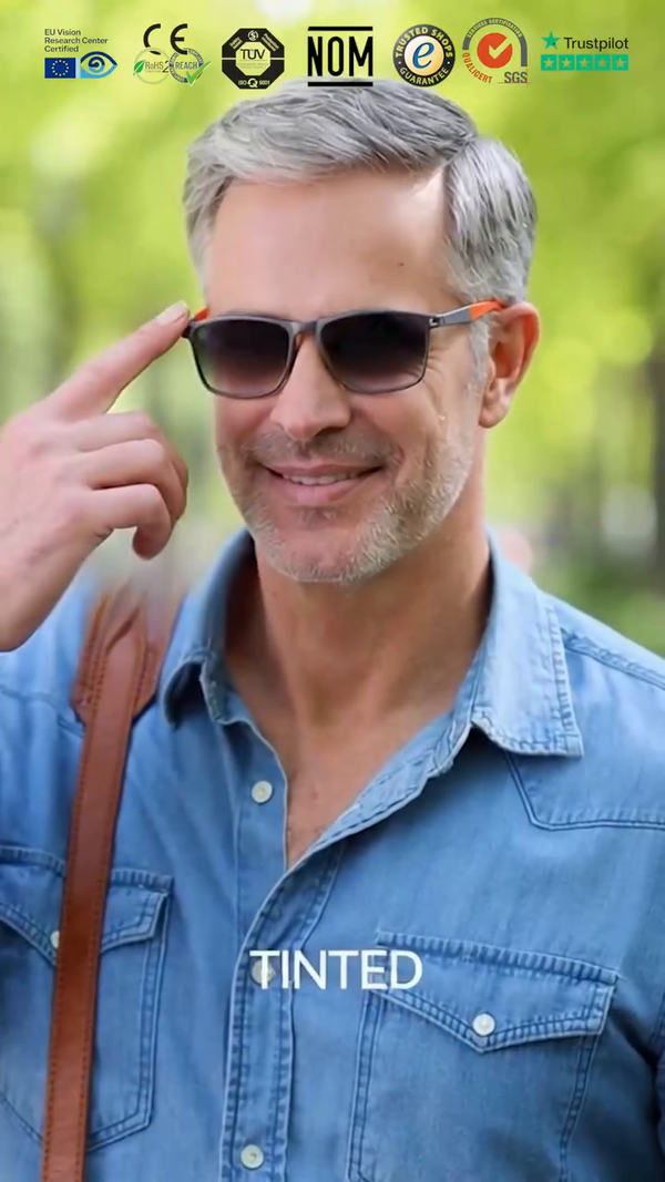 Hombre usando las gafas fotocromáticas oscurecidas al sol