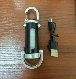 Mini linterna LED COB con abridor de botellas integrado